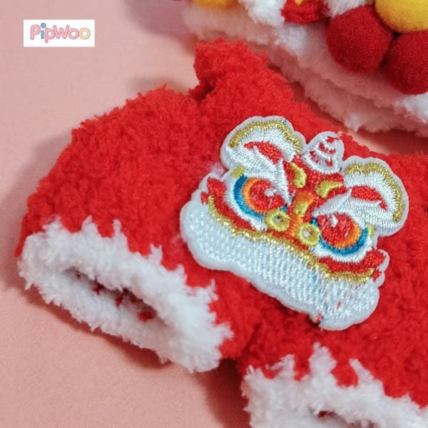 Detailed close-up of PipWoo Crochet Lion Dance Outfit for Labubu Dolls, showcasing the texture and craftsmanship of the crochet design.