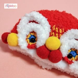 Additional close-up detail of PipWoo Crochet Lion Dance Outfit for Labubu Dolls, highlighting decorative elements and artistic crochet work.