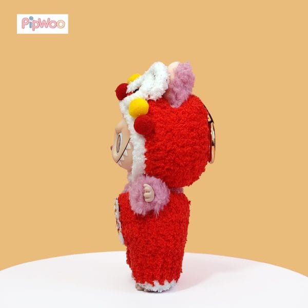 Side view of PipWoo Crochet Lion Dance Outfit for Labubu Dolls, highlighting the tailored fit and elegant crochet patterns.