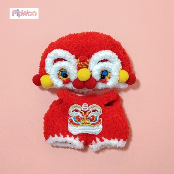 Flat lay of PipWoo Crochet Lion Dance Outfit for Labubu Dolls, presenting the complete design layout and artistic craftsmanship.