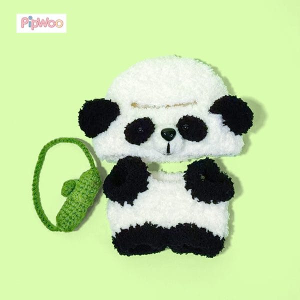 Flat lay display of PipWoo's Panda-themed Crochet Outfit for Labubu Dolls, presenting the complete design layout and intricate crochet craftsmanship.