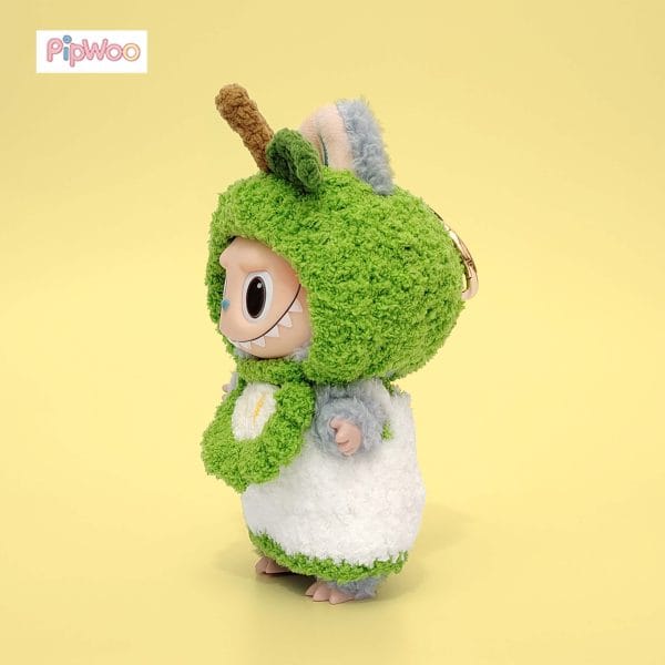 Side view of Crochet Labubu Clothes - Fresh Apple Fantasy displaying the outfit’s profile and intricate stitch patterns.