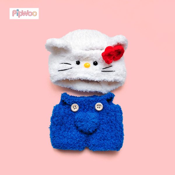Flat lay of Crochet Labubu Clothes – Sweet Kitty showing the full outfit components laid out: hood and romper