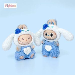 Crochet Labubu Clothes – Cinnamoroll main view showing the floppy‑ear hood with miniature top hat decoration and matching blue onesie