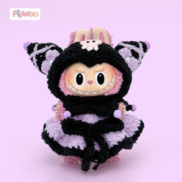 Front view of Crochet Labubu Clothes – Kuromi highlighting the horned hood, skull motif, and flared tutu skirt.